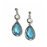 Sterling Silver Rhodium Plated Teardrop Blue Topaz Dangle Earrings with White Topaz Accent